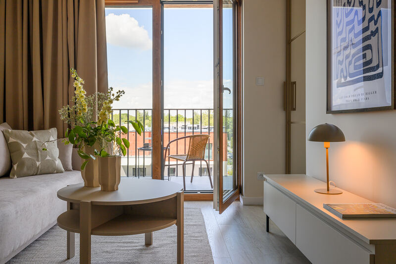 Bright living room with balcony, Wellcome Home flat in Katowice