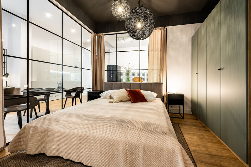 Bedroom with double bed and wardrobe