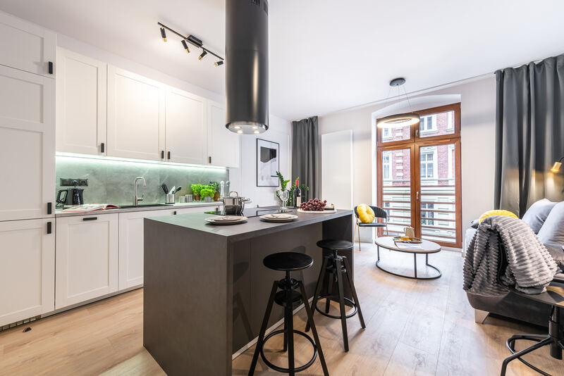 Kitchen with island and bar stools