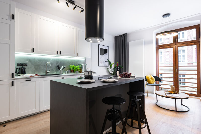 Kitchen island and seating area in a studio